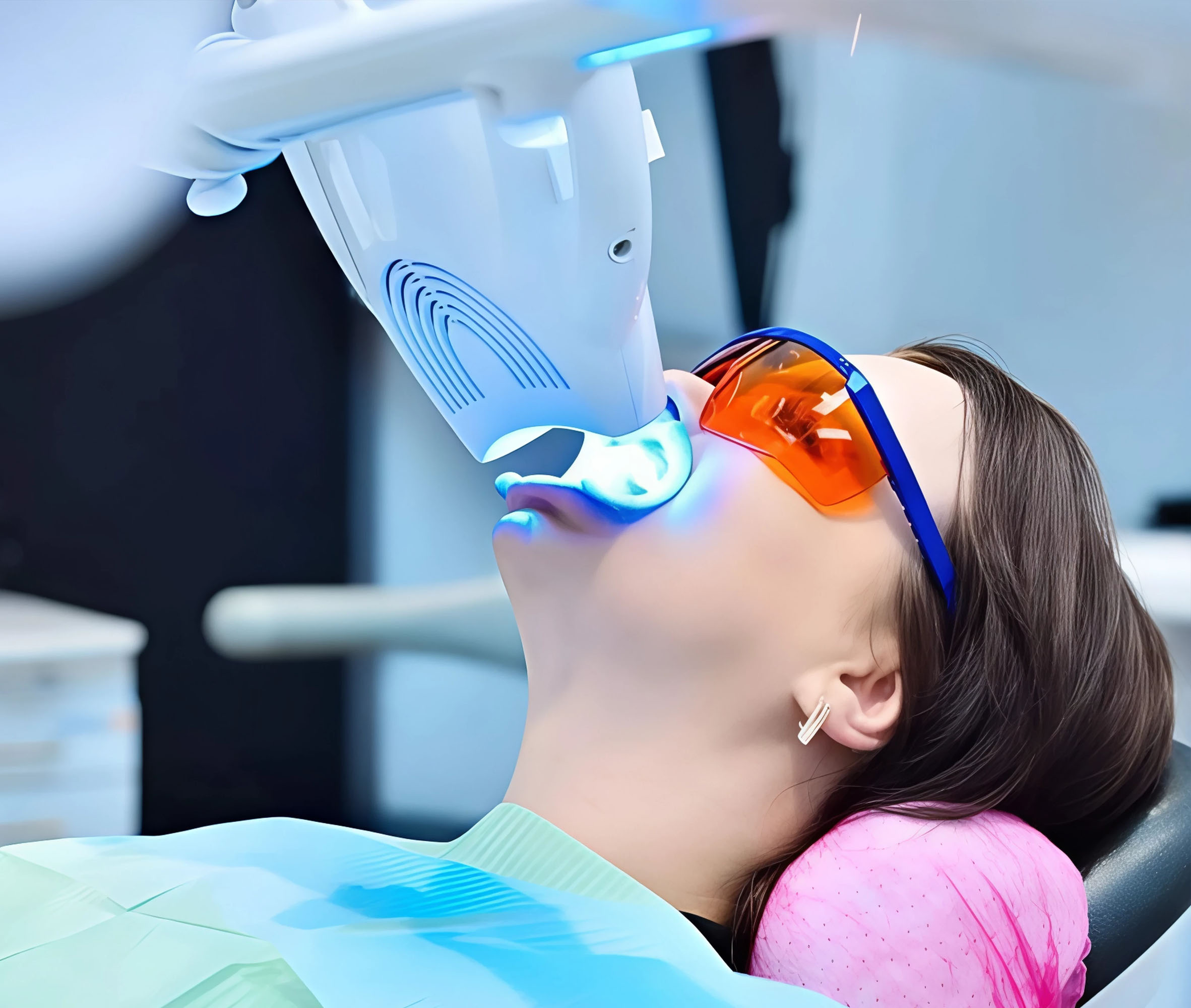 Dentist is checking up a patient with an ortodental system